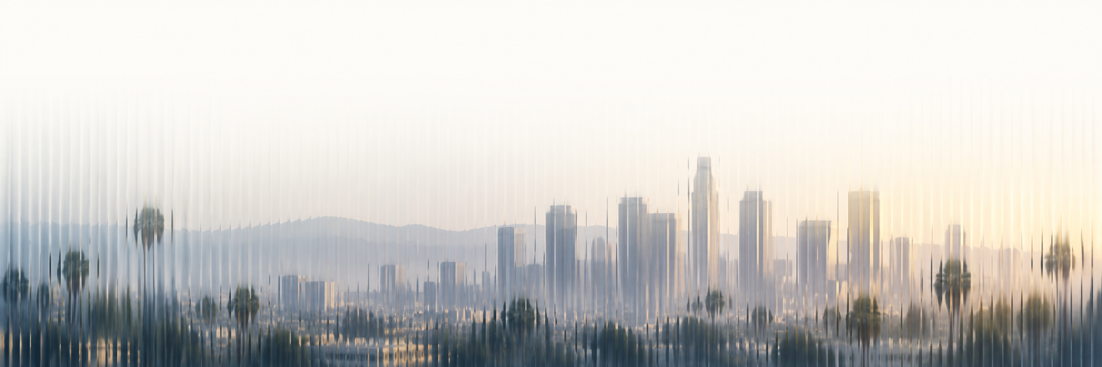 Los Angeles skyline seen through shimmering ribbed glass; illustrative editorial artwork
